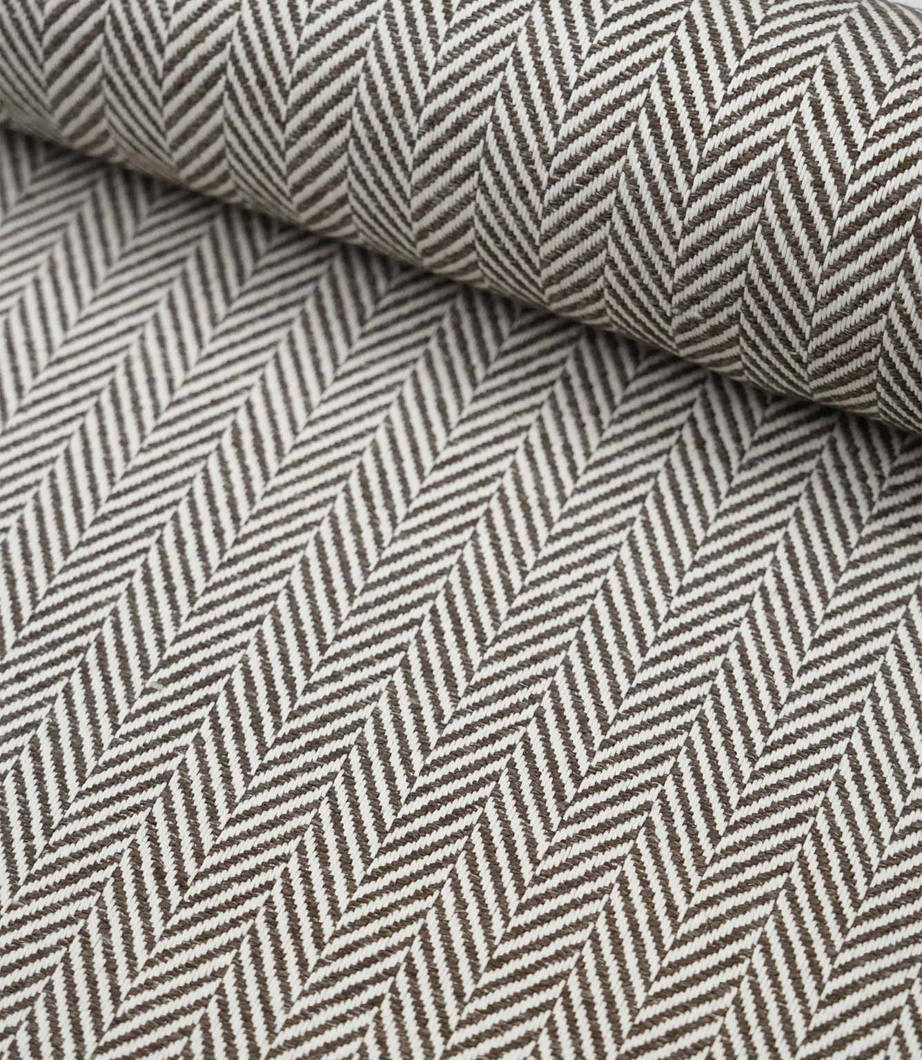 Wide view of Bampton Bison woven herringbone fabric displaying the continuous chevron pattern across the fabric width.