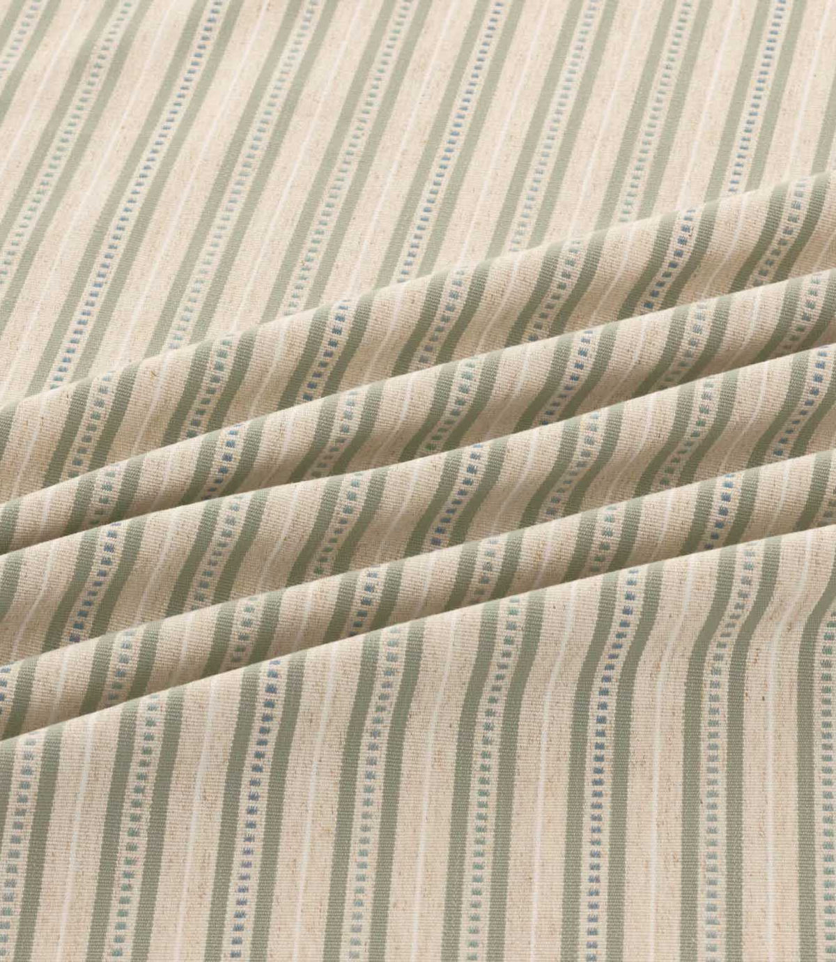 Close-up of Brookhaven Cascade striped fabric arranged in soft folds, showing sage green and muted blue vertical stripes, decorative dotted lines and textured weave.