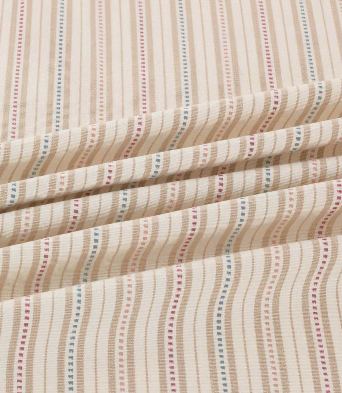 Brookhaven Shell striped fabric arranged in soft folds, highlighting delicate blush pink, muted blue and terracotta stripes with decorative dotted detailing.