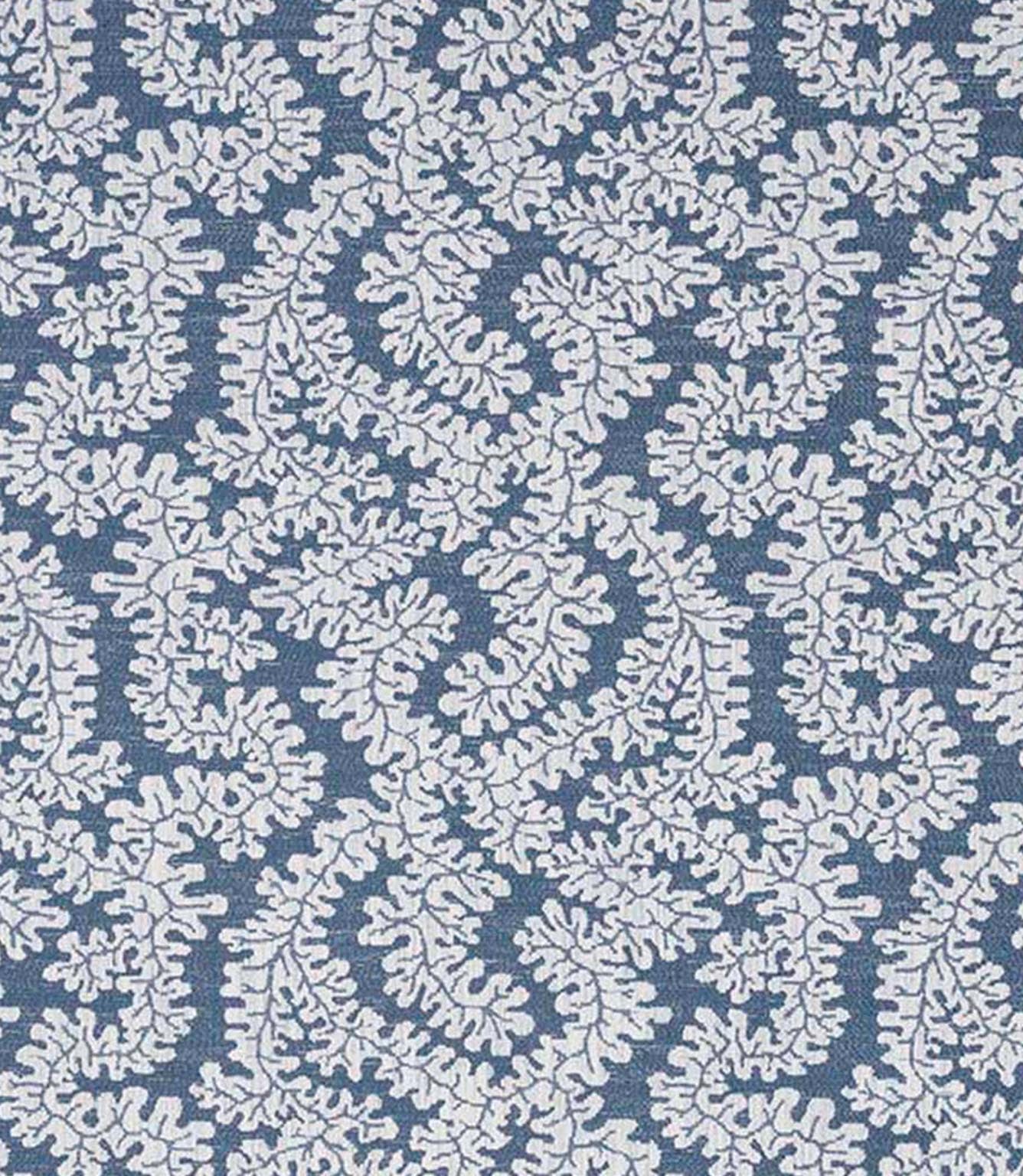 Close-up of woven foliage fabric featuring a delicate leaf pattern in soft blue and off-white tones, with a gently textured surface.