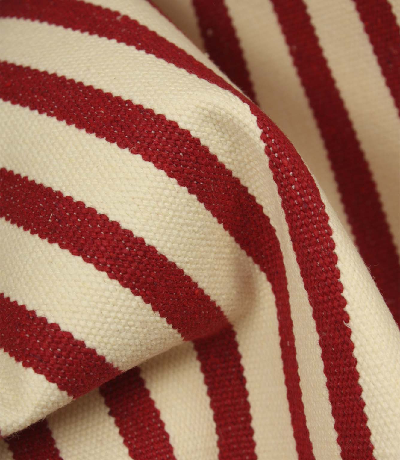 Detailed close-up of Fernley Stripe wine red striped upholstery fire retardant fabric showing the textured weave and traditional stripe pattern.