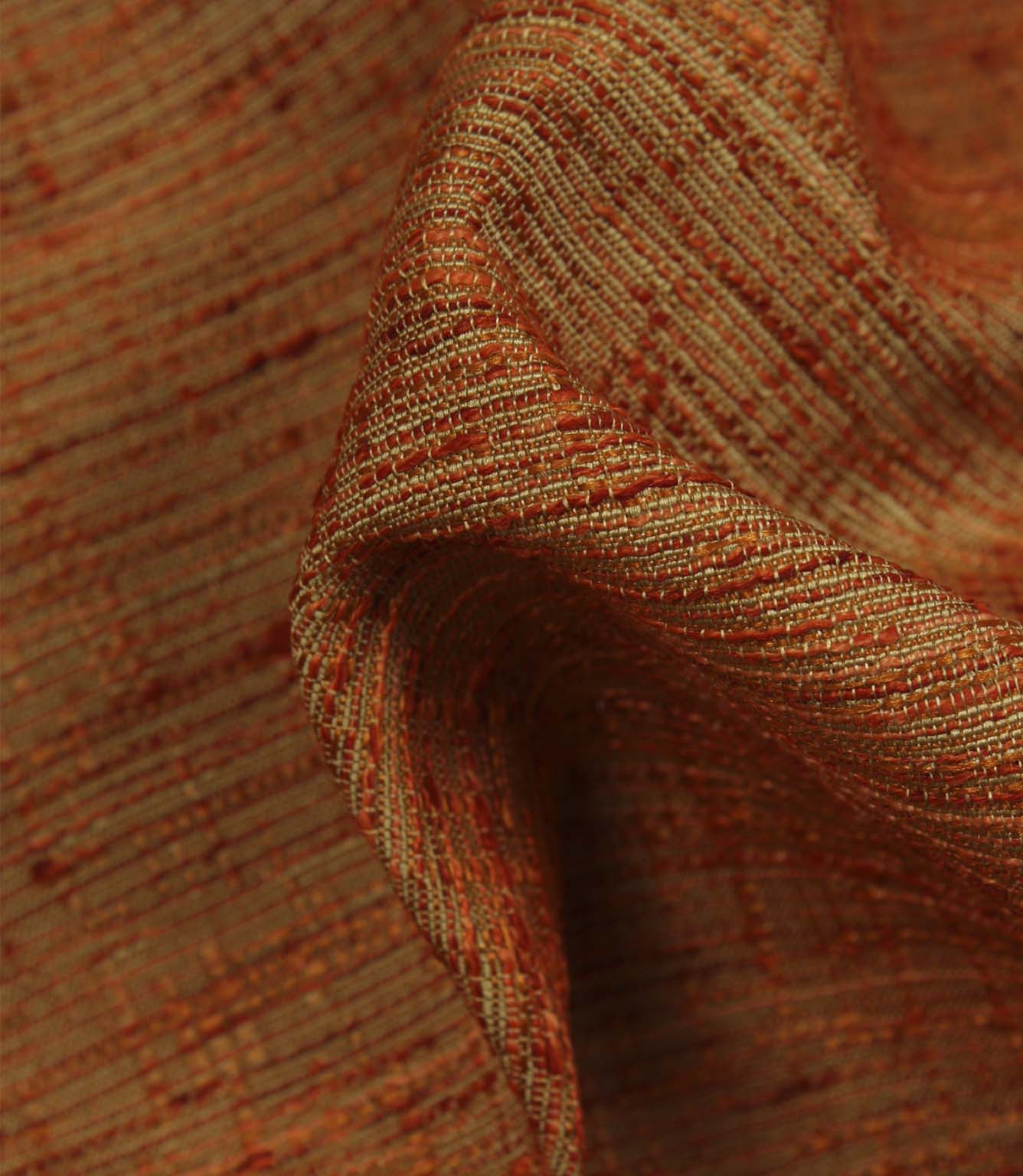 Detailed close-up of Otaru woven plain fabric in sunset orange, featuring the intricate weave, textured yarns and dimensional surface finish.