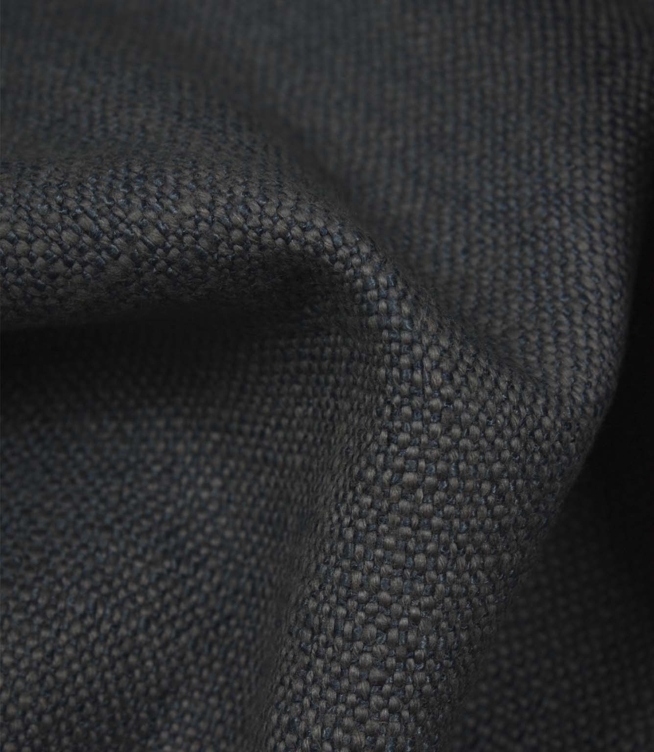 Detailed close-up of Trento plain woven fabric in indigo, featuring the tactile weave and elegant textured finish.