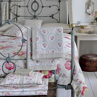 Use floral fabric for a romantic bedroom scheme