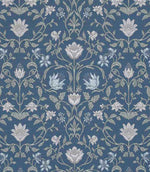 Close-up of a traditional floral fabric showing detailed botanical motifs in soft ivory and pale blue on a deep denim blue background, highlighting the fine linework and woven texture.