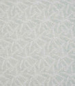 Detailed view of leaf-patterned woven fabric in muted green and off-white tones, showing an intricate foliage motif with a subtle tactile finish.