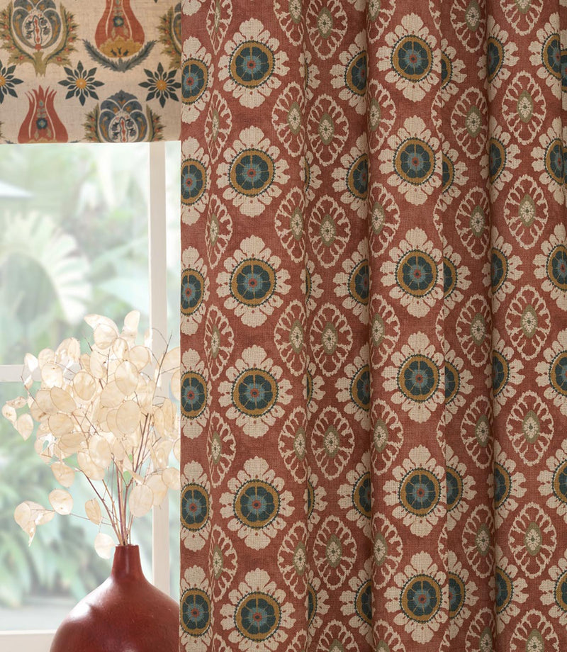 Close up of Maya designer fabric curtains showing small scale floral pattern and soft drape for interior furnishings
