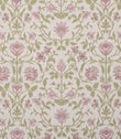 Close-up fabric view with vibrant coral pink floral motifs, soft green foliage and neutral accents on a light natural background, highlighting the richness of the pattern and colour contrast.