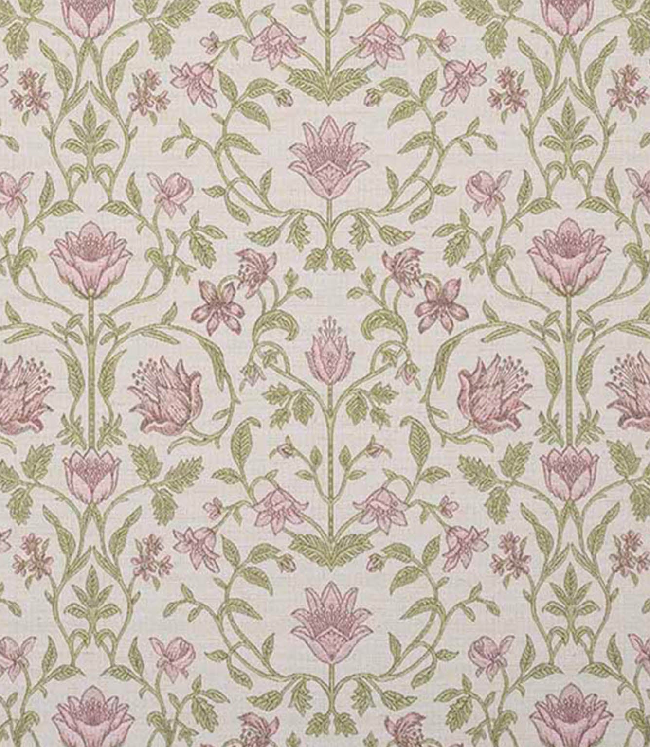 Close-up fabric view with vibrant coral pink floral motifs, soft green foliage and neutral accents on a light natural background, highlighting the richness of the pattern and colour contrast.