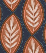Close-up of Amber Canopy outdoor fabric featuring terracotta and blush foliage motifs on a deep navy textured background.