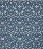Traditional floral and foliage fabric featuring an intricate symmetrical pattern in soft ivory and pale blue motifs set against a rich denim blue background, with delicate trailing stems and stylised blossoms.