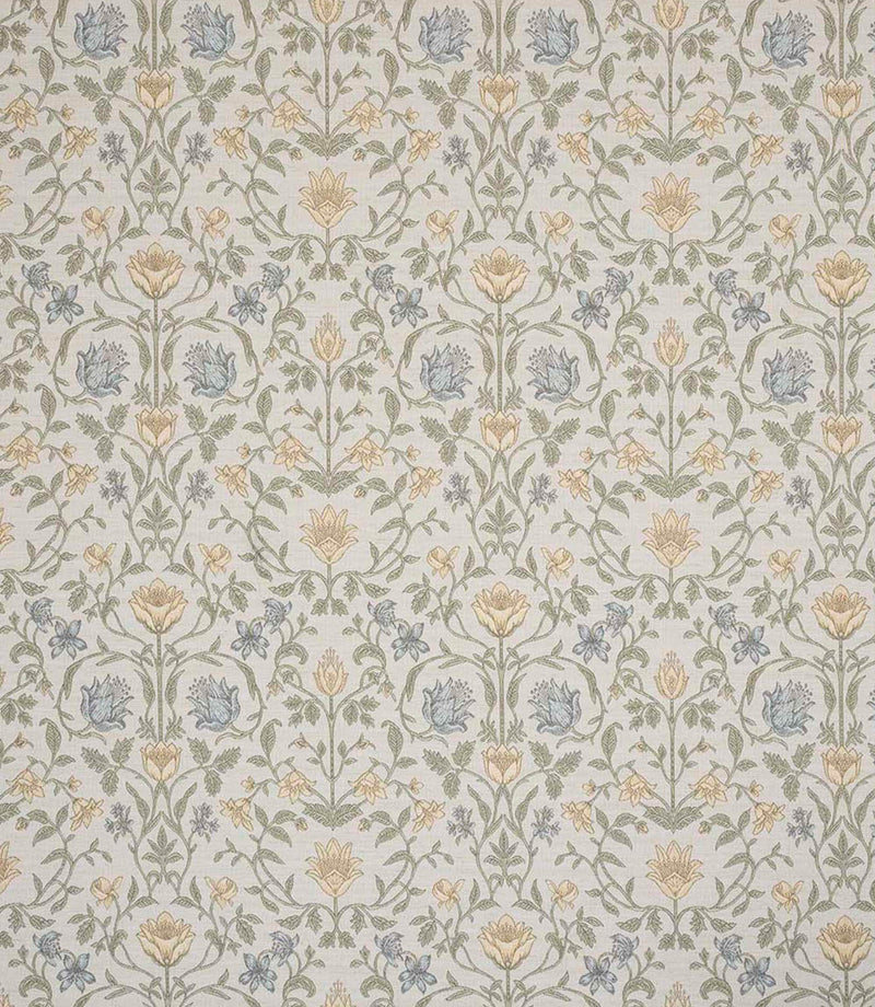 Refined traditional fabric showcasing a detailed floral and foliage pattern in soft butter yellow, pale blue and gentle green hues on a light neutral ground, creating a subtle and airy look.