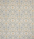 Refined traditional fabric showcasing a detailed floral and foliage pattern in soft butter yellow, pale blue and gentle green hues on a light neutral ground, creating a subtle and airy look.