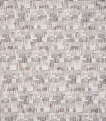 Detailed view of contemporary woven fabric showing a small-scale geometric check design in muted grey and natural tones, with subtle variation in texture and depth.