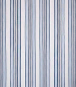 Woven stripe fabric featuring alternating narrow and wide vertical lines in soft blue tones on a light neutral background, with subtle texture and a balanced, tailored appearance.