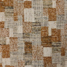 Detailed view of Terrana contemporary check fabric showing a mix of woven yarns in earthy rust, beige, and neutral shades, highlighting its tactile, layered surface.