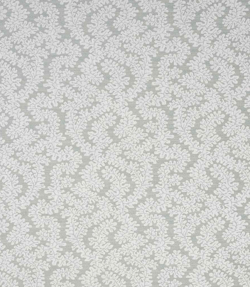 Detailed view of contemporary foliage upholstery fabric in muted sage and ivory tones, showing an intricate leaf design and natural woven texture.