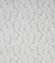 Detailed view of contemporary foliage upholstery fabric in muted sage and ivory tones, showing an intricate leaf design and natural woven texture.