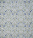 Detailed designer fabric featuring a repeating floral and foliage pattern in muted blue, green and neutral shades with a soft, classic look.
