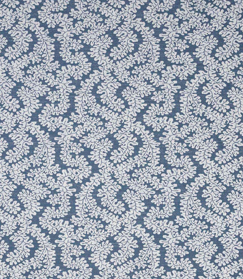 Detailed view of contemporary foliage upholstery fabric in muted blue and ivory tones, showing a natural woven texture and intricate leaf design.