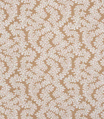 Detailed view of contemporary foliage patterned upholstery fabric in earthy brown and cream tones with a subtle woven texture.