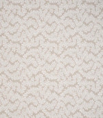Detailed view of foliage patterned woven fabric with an organic, layered design in warm neutral and cream tones.