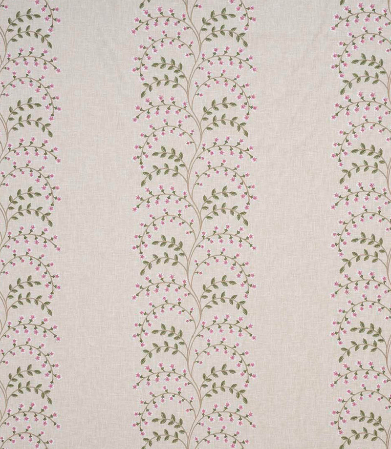 Wide view of embroidered floral fabric with repeating vertical trails of pink blossoms and green foliage set against a soft neutral background, highlighting pattern spacing and flow.
