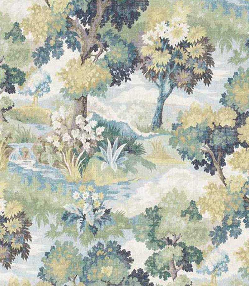 Designer fabric with a scenic landscape pattern featuring layered trees and foliage in soft green, sage and olive tones, with accents of pale blue water and gentle beige highlights.
