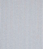 Woven ticking stripe fabric with fine vertical lines in soft blue and neutral tones, set against a light background with a subtle herringbone texture and a calm, tailored appearance.