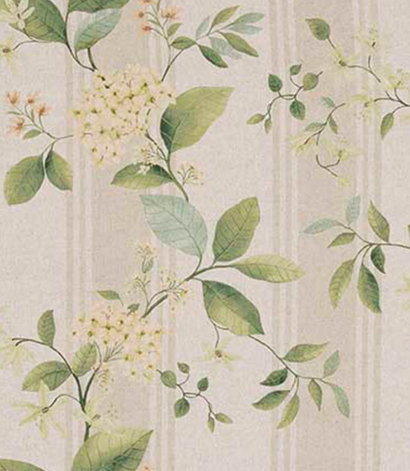 Designer fabric featuring soft green foliage with delicate pale yellow floral clusters on a warm neutral beige background, set against subtle tonal vertical stripes.