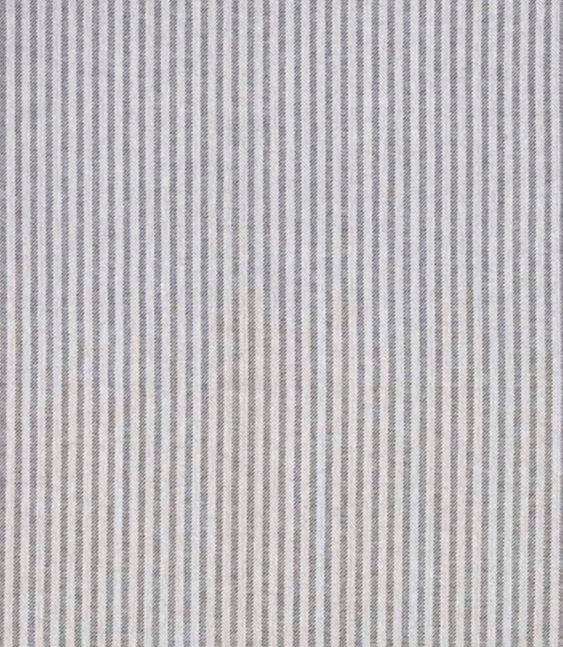 Woven ticking stripe fabric with closely spaced vertical lines in soft grey and charcoal tones on a light background, featuring a refined, understated pattern with gentle texture.