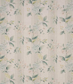 All-over foliage and floral designer fabric featuring sage green leaves, hints of soft blue and blush blossoms on a beige striped ground, creating a light and airy botanical feel.