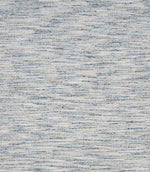 Detailed view of textured woven upholstery fabric featuring a blend of blue and natural tones with a fine, layered linear pattern.