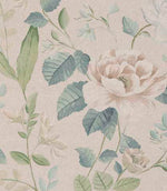Designer fabric with soft, painterly floral blooms in warm beige and blush tones, complemented by muted blue and sage green foliage on a light neutral background.