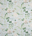 All-over floral designer fabric with trailing foliage in muted blue and green shades set against a light blue ground.