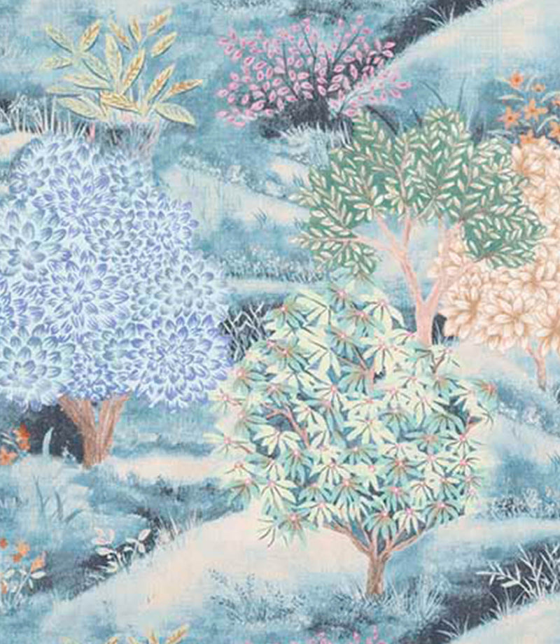 Fabric with colourful illustration of trees and plants in a forest landscape