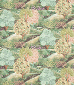 Patterned fabric of trees and bushes on a green background