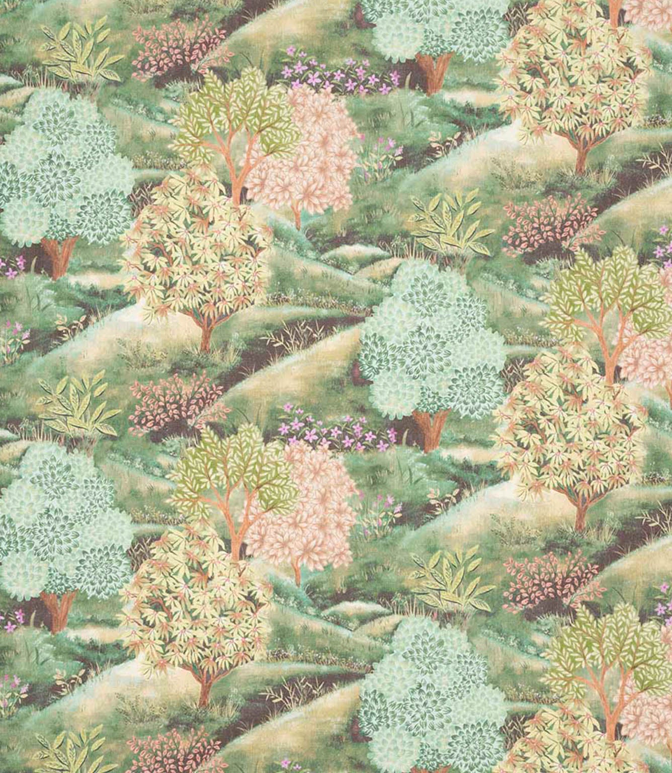 Patterned fabric of trees and bushes on a green background