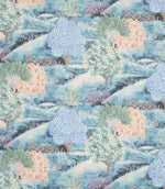 Patterned fabric with trees and flowers in pastel colors on a blue background