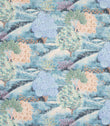 Patterned fabric with trees and flowers in pastel colors on a blue background