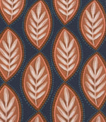 Full repeat view of Amber Canopy foliage outdoor fabric showing geometric leaf motifs in earthy terracotta and cream on a navy background.