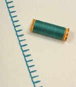 Stitched Up Fabric / Ivory / Teal - Just Fabrics