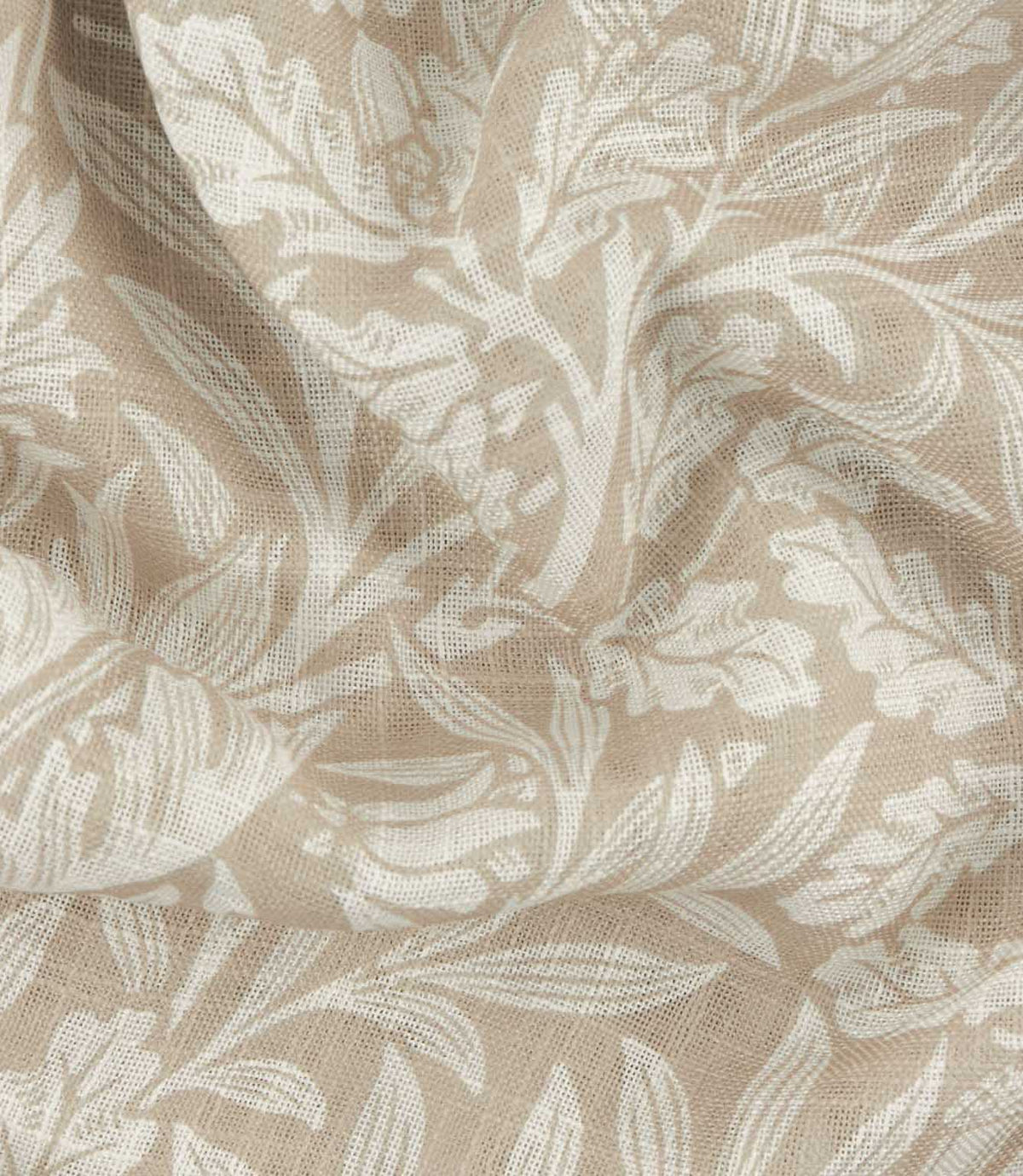 Close-up of Morris & Co Acorn sheer fabric in cream and beige, showing the lightweight open weave and detailed William Morris acorn and foliage design.