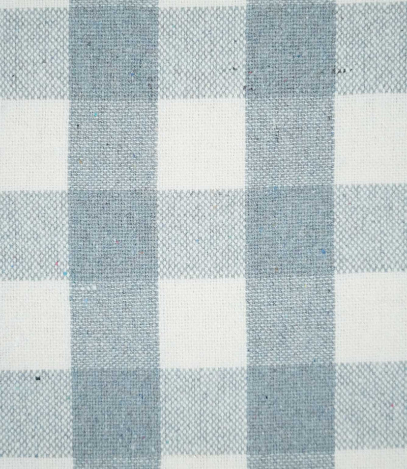 Close-up of Aldsworth Check Haze fabric showing the detailed woven texture and intersecting blue and white checks with subtle flecks in the yarn.