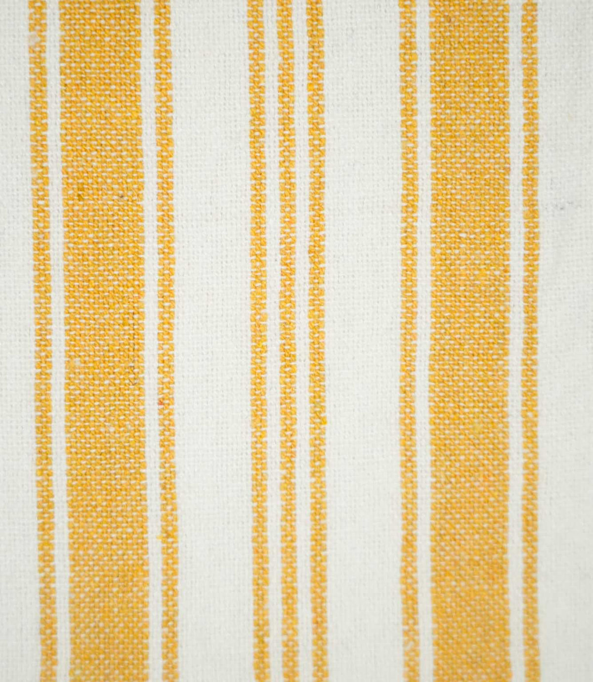 Close-up of Aldsworth Stripe Ochre fabric showing the detailed woven texture and alternating golden ochre and off-white vertical stripes.