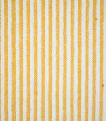 Aldsworth Ticking Ochre fabric featuring narrow golden ochre and off-white vertical stripes in a classic ticking design with a textured woven finish.