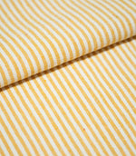 Folded Aldsworth Ticking Ochre fabric displaying its narrow ochre and off-white stripe pattern and detailed woven texture.