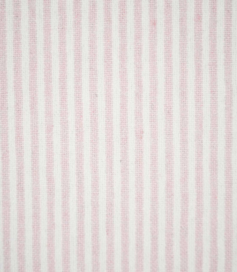 Aldsworth Ticking Pink fabric featuring fine, evenly spaced blush pink and off-white vertical stripes with a subtle woven texture.
