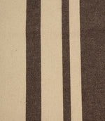 Close-up of brown and cream striped woven fabric showing the textured weave and contrasting stripe detail.