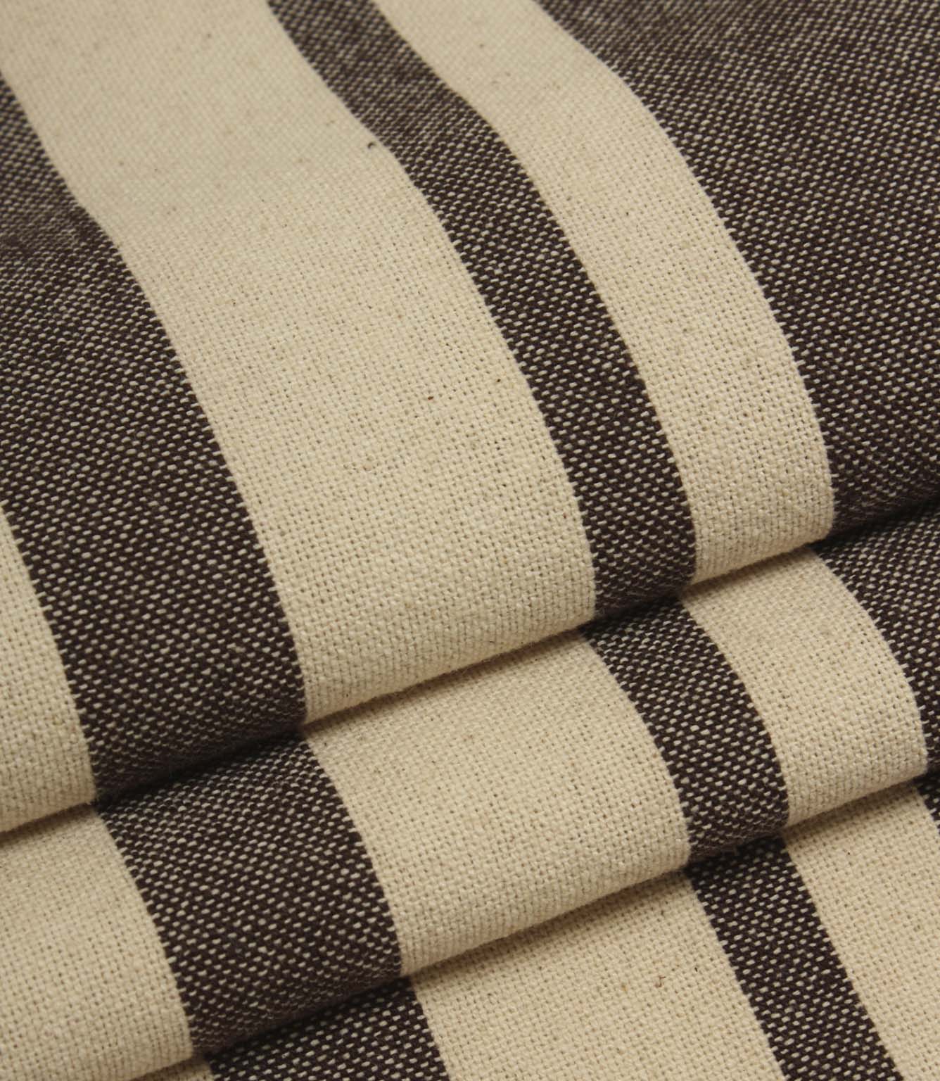 Neutral striped upholstery fabric in brown and natural tones with a textured woven surface.